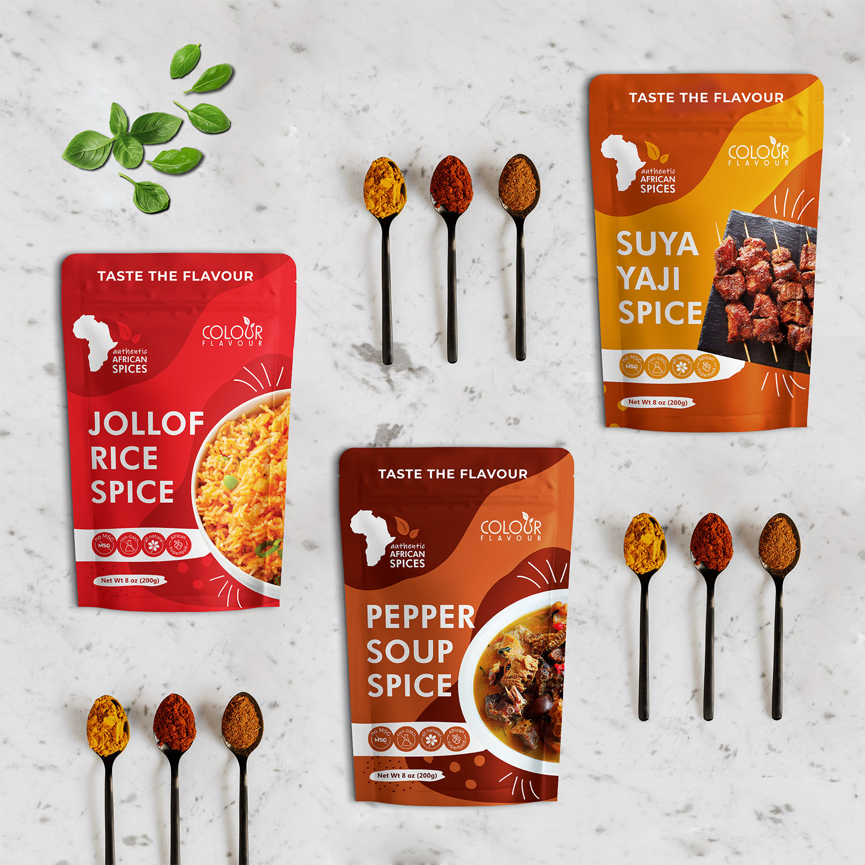 Three pouches with spices lay on marble table top, surrounded by tea spoons with spices and some basil.